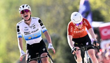 FDJ United - Suez's Dutch Demi Vollering celebrates as she crosses the finish line next to Fenix-Premier Tech's Dutch Puck Pieterse to win 'La Fleche Wallonne'