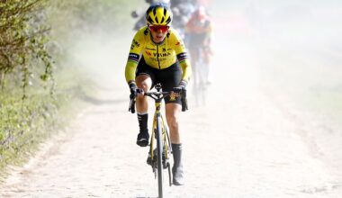 A head-on shot of Pauline Ferrand-Pr&eacute;vot riding on a cobbled section of Paris-Roubaix in 2025. It is bright and dusty behind her