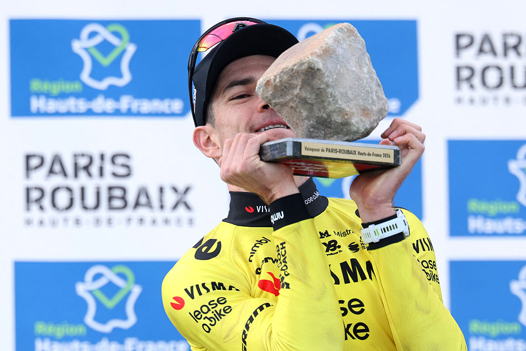Wout van Aert holds the cobble trophy as winner of Paris-Roubaix 2026