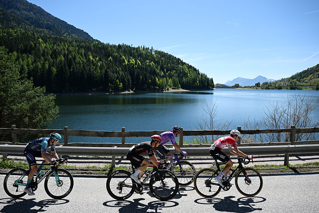 (L-R) Rainer Kepplinger of Austria and Team Bahrain - Victorious, Lennart Jasch of Germany and Team Tudor Pro Cycling, Christopher Juul-Jensen of Denmark and Team Jayco AlUla and Simone Raccani of Italy and Team Ukyo compete in the breakaway at Tour of the Alps 2026, Stage 4 (Photo by Tim de Waele/Getty Images)