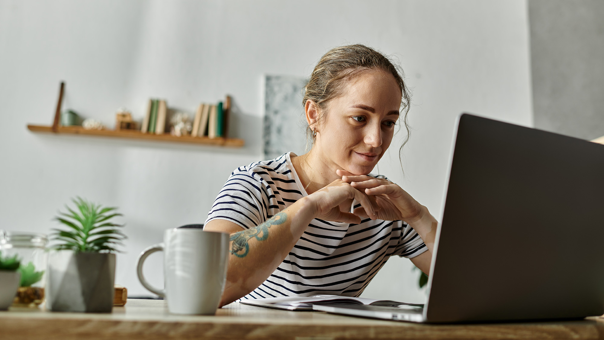Woman at desk working from home