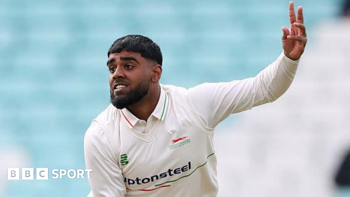 Rehan Ahmed in his follow through after delivering the ball during an over for Leicestershire