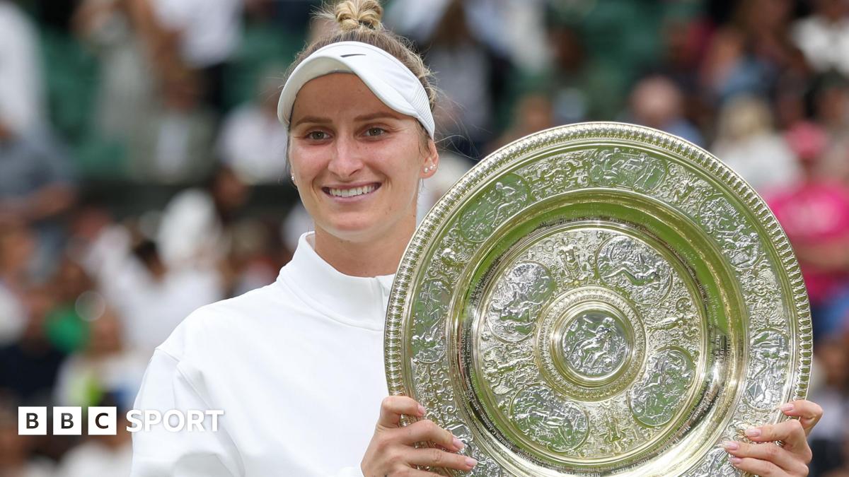 Marketa Vondrousova holding the Wimbledon trophy after winning the women's title in 2023