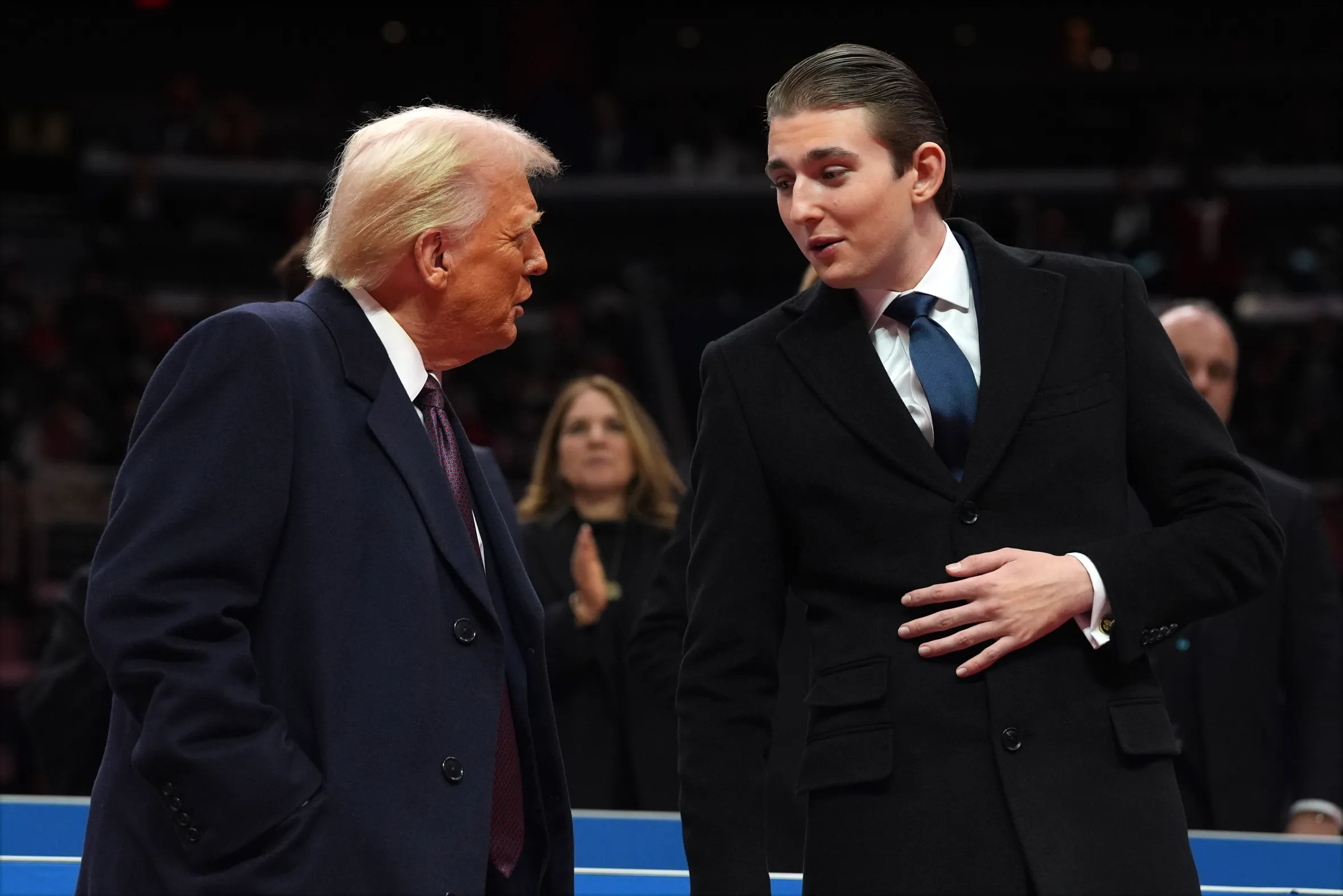 Donald Trump talking to his son Barron Trump.