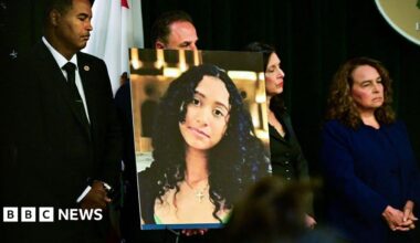A portrait of the late Celeste Rivas Hernandez is shown during a press briefing by the Los Angeles County District Attorney and is flanked by other officials.
