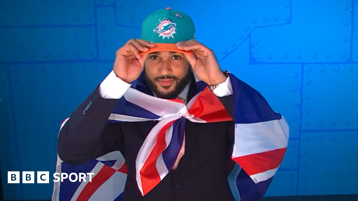 Uar Bernard, wearing black shorts and a black support vest over a grey t-shirt, is seen with his head down while sprinting