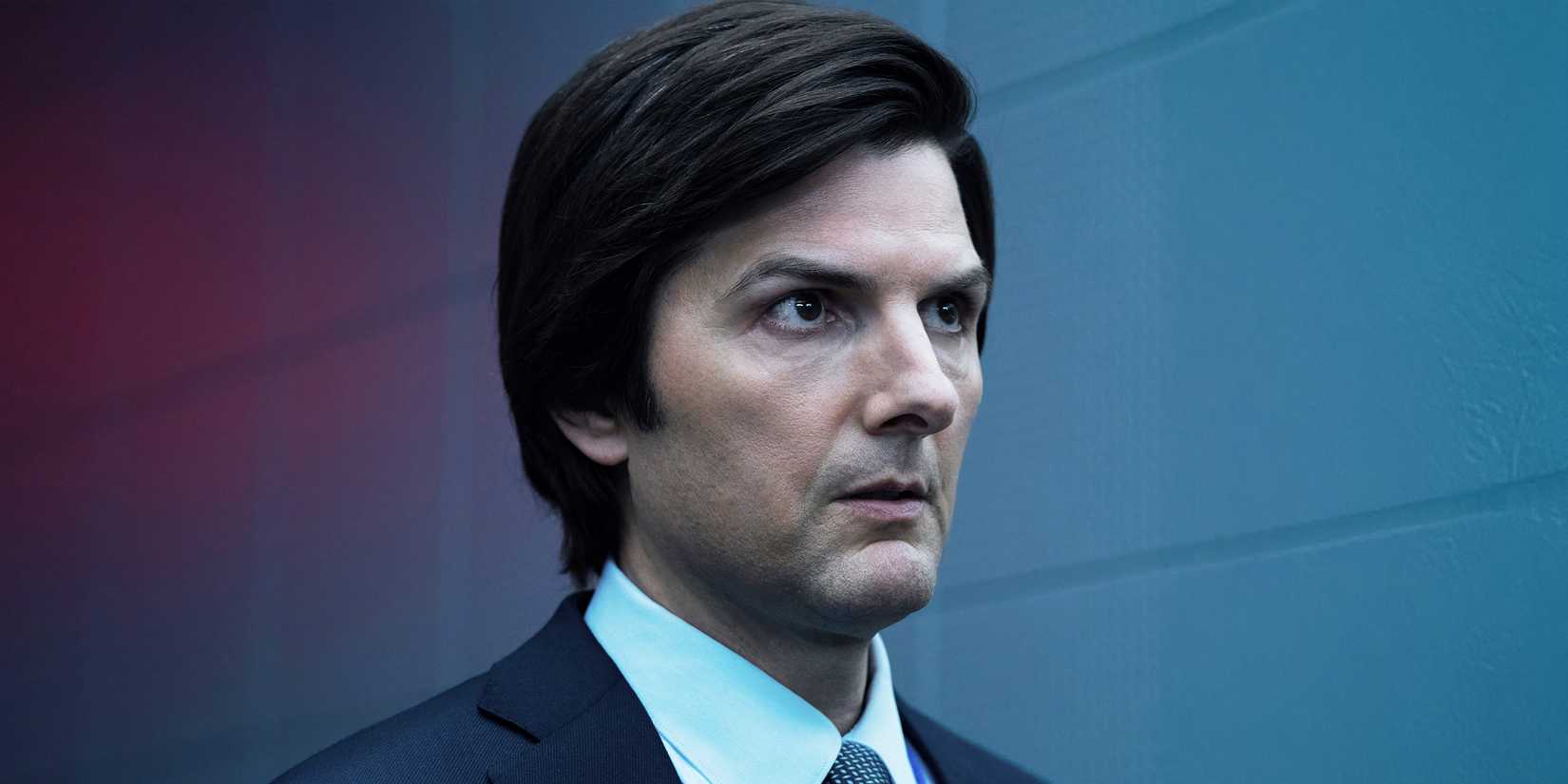 Adam Scott in a hallway in Severance