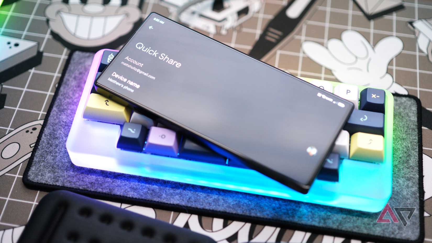 Redmagic 9s Pro showing Quick Share menu while laying on top of small keyboard