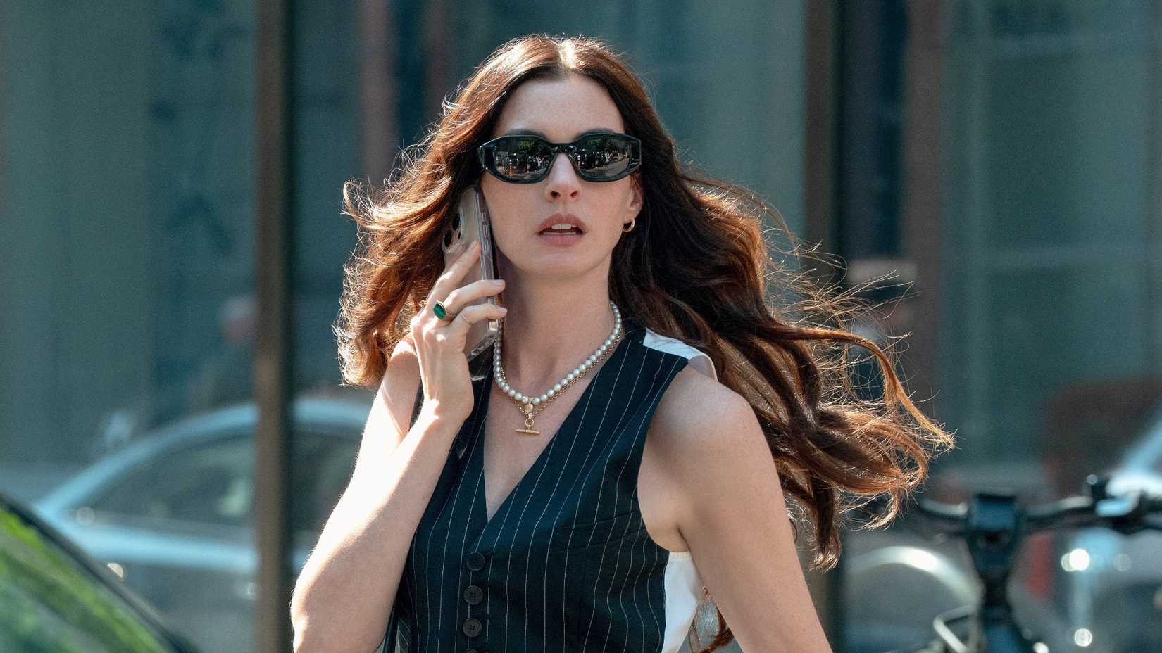 Anne Hathaway as Andrea Sachs talking on the phone in The Devil Wears Prada 2