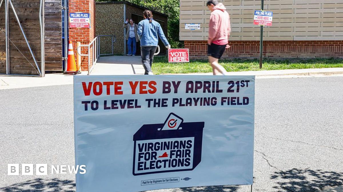 A "Vote Yes" sign as voters arrive to cast their ballots at a polling location inside Abingdon Elementary School during a special election in Arlington, Virginia, US, on Tuesday, April 21, 2026.
