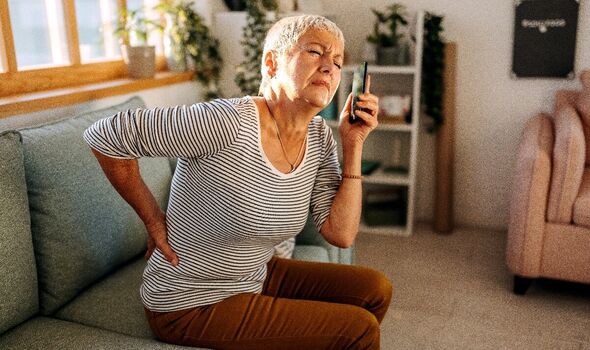 A woman with back pain