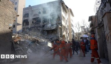 Iranian workers clear rubble at the site of a synagogue that was destroyed in an Israeli air strike, in Tehran, Iran (7 April 2026)