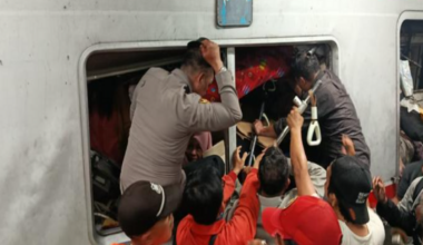 Evacuation of passengers on the train involved in an accident at East Bekasi Station, near Jakarta, Indonesia
