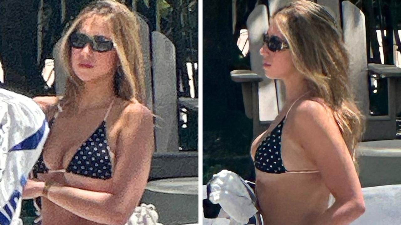 Tate McRae spotted poolside wearing tiny spotted bikini