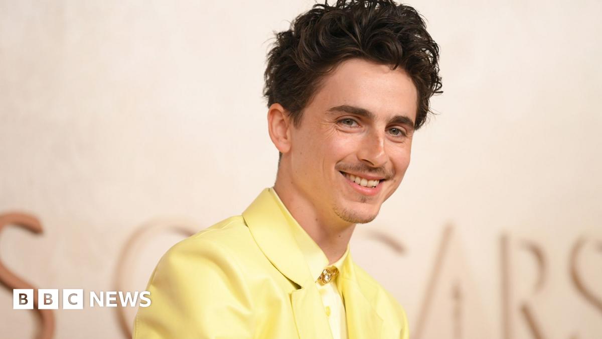 Timothée Chalamet pictured last month wearing a yellow suit