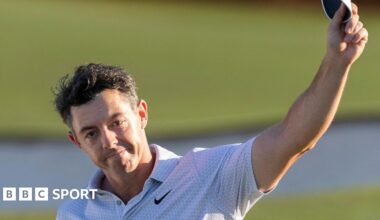 Rory McIlroy waves his cap to the Masters crowd