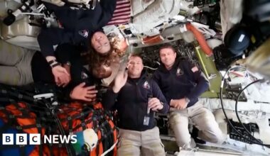 Astronauts in their rocket in space