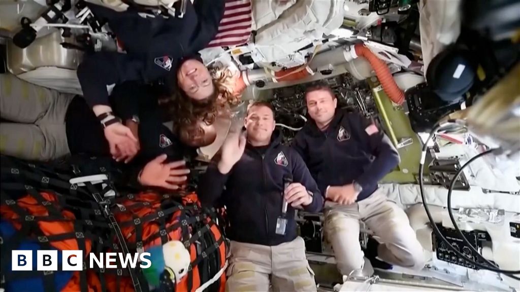 Astronauts in their rocket in space