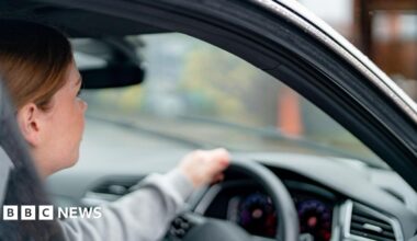 Driver behind the wheel of a car