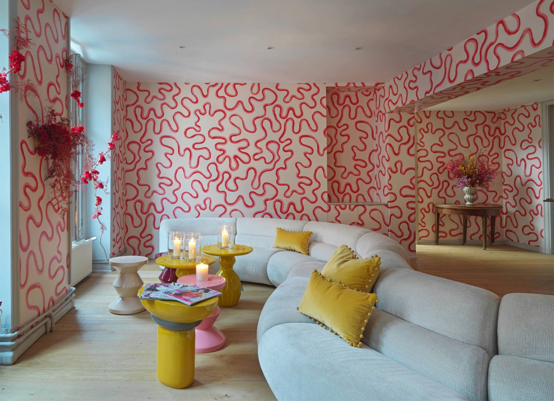 living room with unique wallpaper and modern furniture