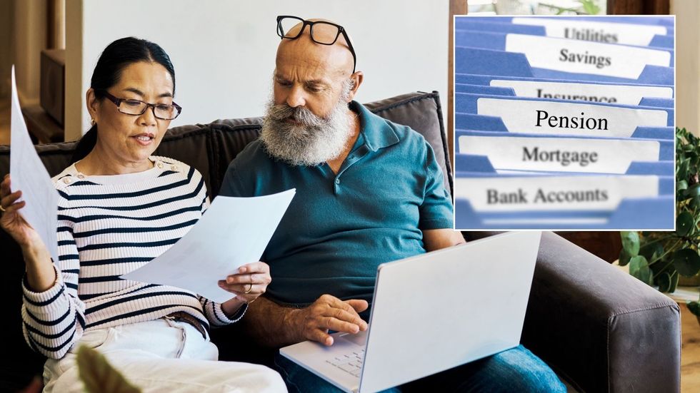 Couple looking at pension documents
