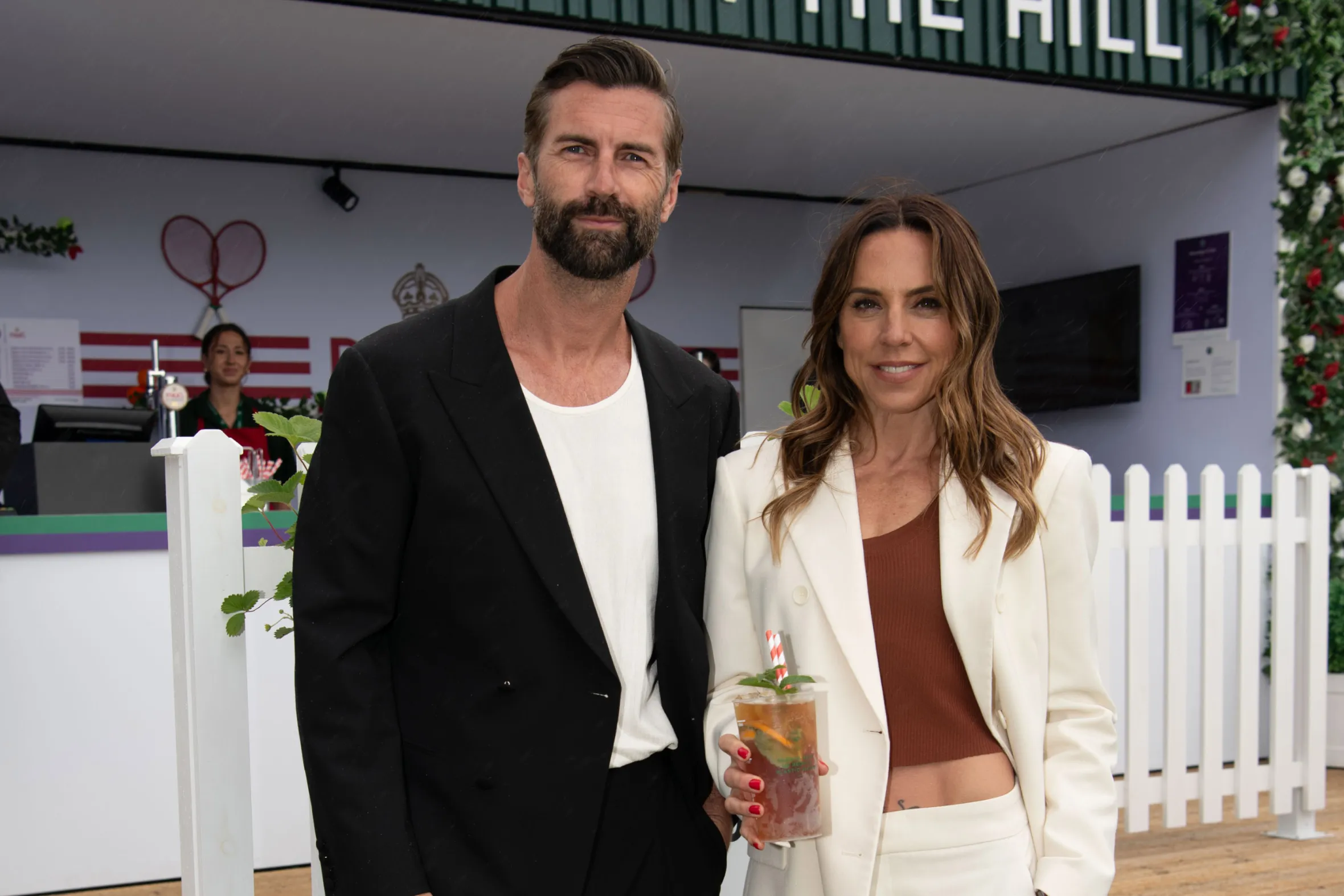 Melanie C and Chris Dingwall with Pimm's cocktails at "Pimm's on the Hill."