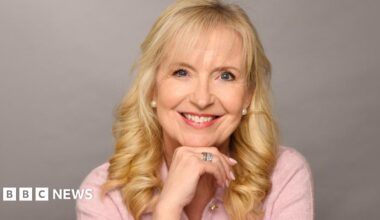 Outgoing BBC Weather presenter Carol Kirkwood smiles in a portrait taken to mark her departure from the BBC. She is wearing a light pink top.