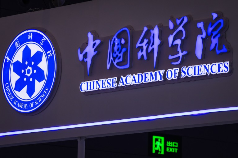 An illuminated sign of the Chinese Academy of Sciences displayed at their booth during a hi-tech fair.
