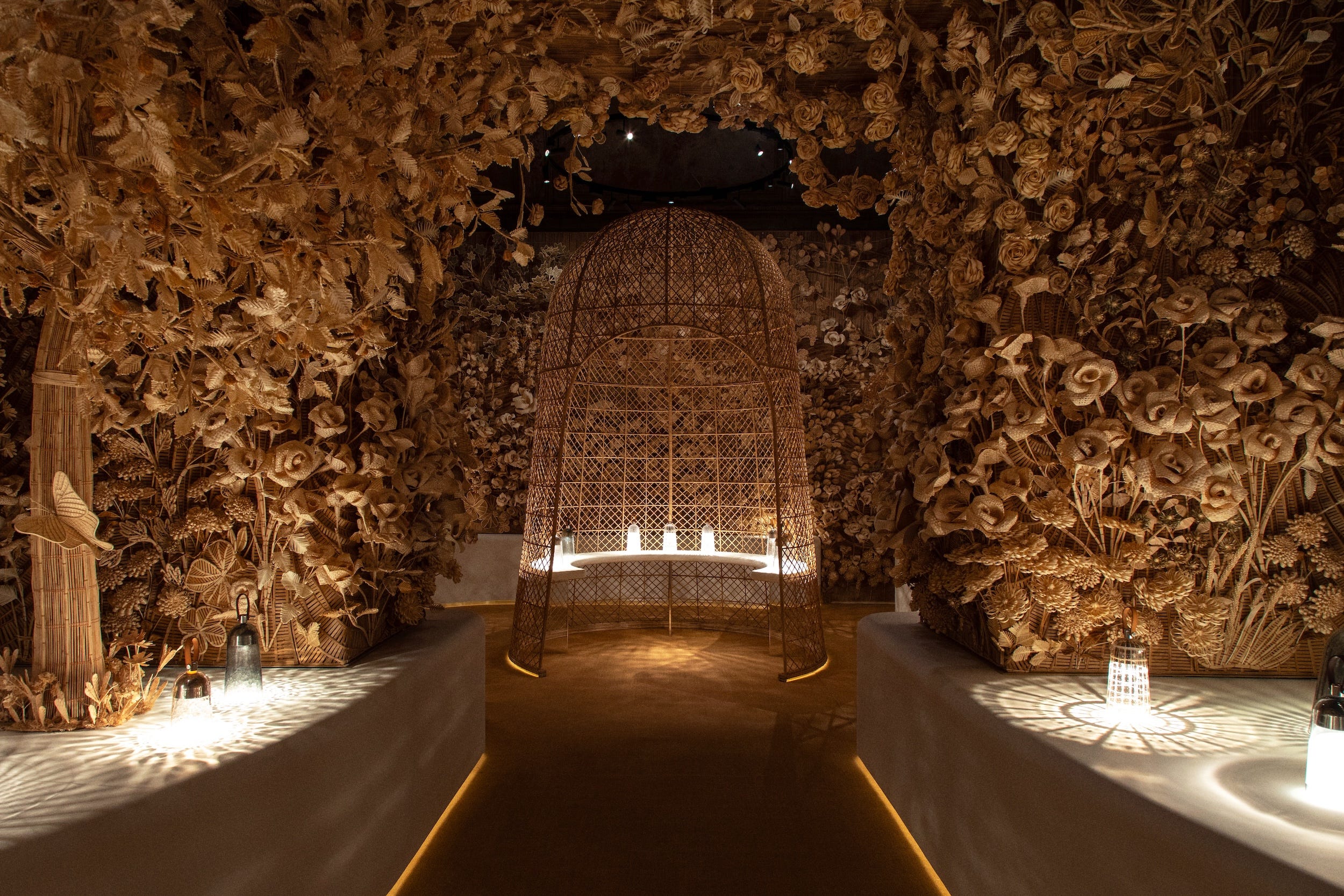 interior space decorated with intricate floral motifs made from natural materials