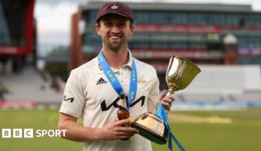 Cameron Steel holds the County Championship trophy