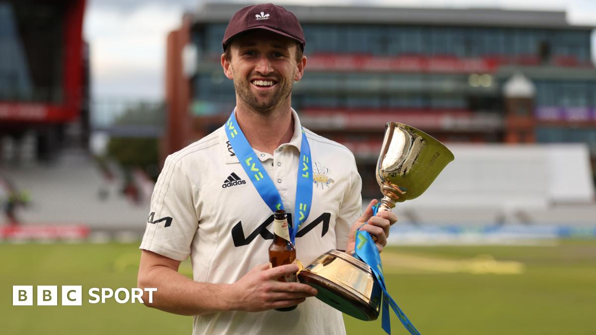 Cameron Steel holds the County Championship trophy