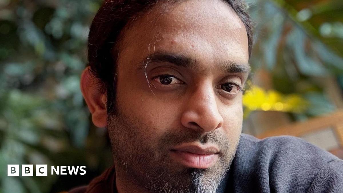 Pic of man with stubble and grey top