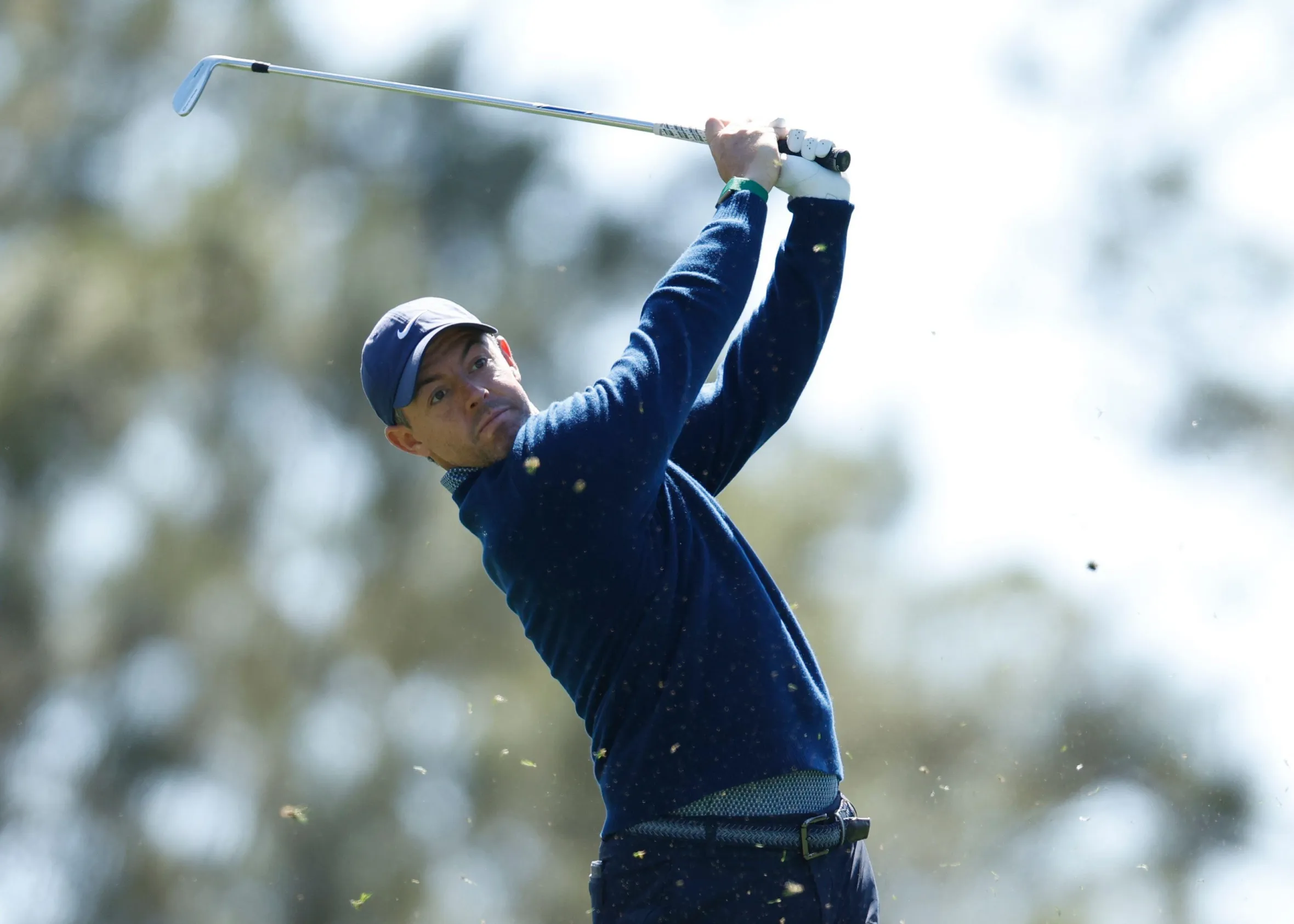 Augusta, United States. 09th Apr, 2026. Rory McIlroy of Northern Ireland tosses his club after his tee shot on the 4th hole during the first day of the Masters Tournament at Augusta National Golf Club on Thursday, April 9, 2026, in Augusta, Georgia.