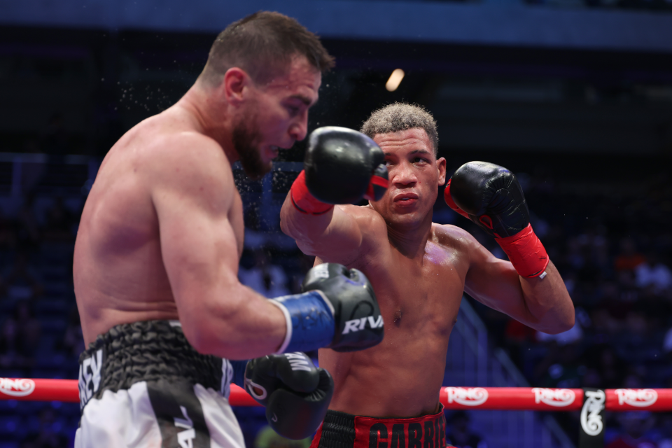 David Morrell throwing a punch