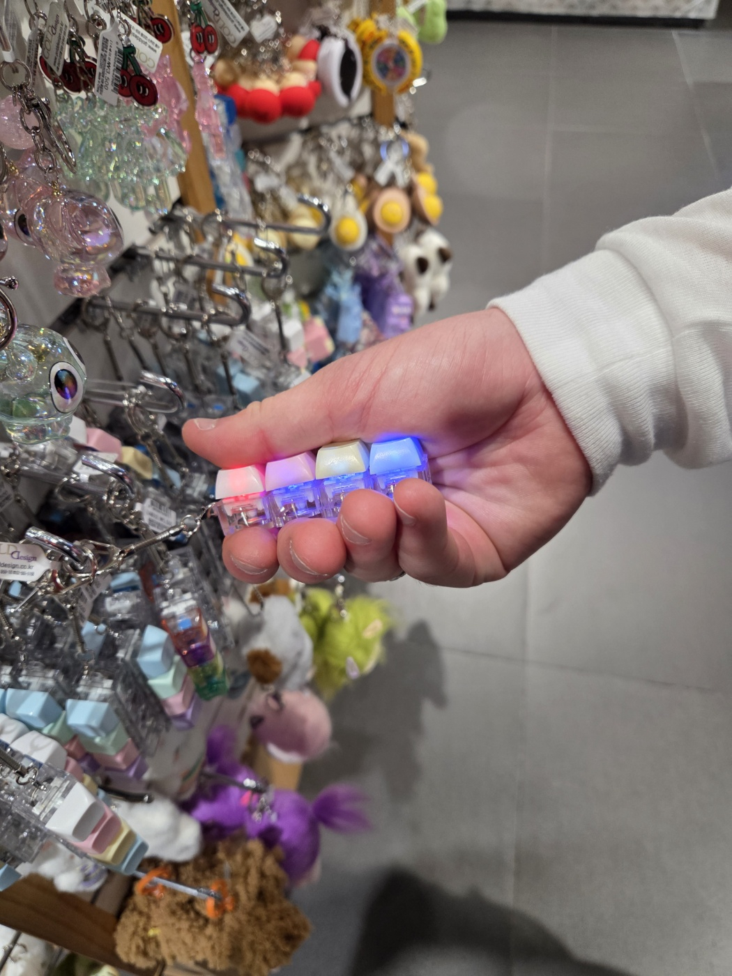 A keycap keyring is displayed in Kyobo Book Centre's Dongdaemun branch in Jung District, central Seoul, on April 21. [KIM MIN-YOUNG]