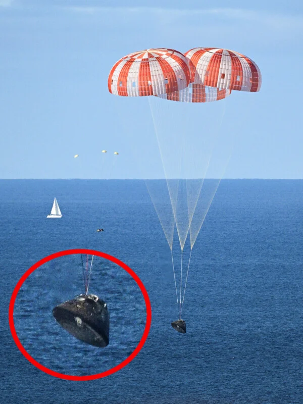 A space capsule with three orange-and-white parachutes descends toward the ocean, with a sailboat visible in the background. An inset zooms in on the capsule approaching the water's surface.