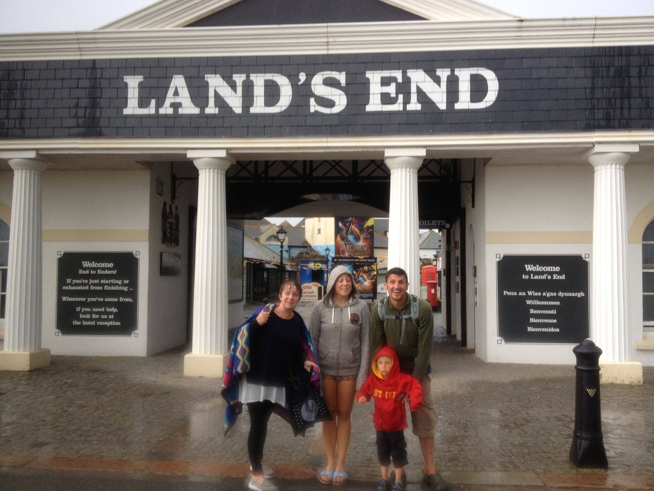 family very wet at Land's End