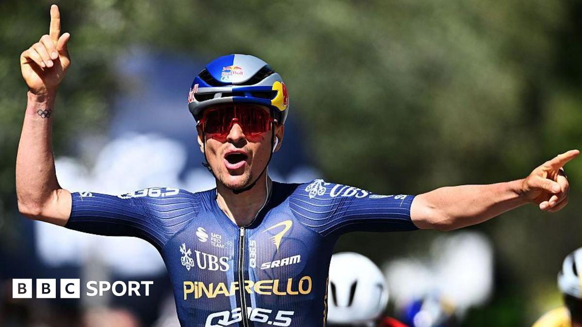 Tom Pidcock celebrates after winning stage 3 of the Tour of the Alps