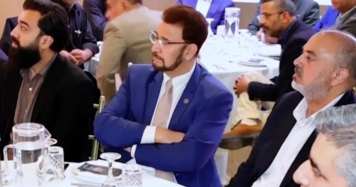 Afzal Khan MP (blue suit) with Baron Ahmed (white trousers navy jacket) at a BT Properties event.