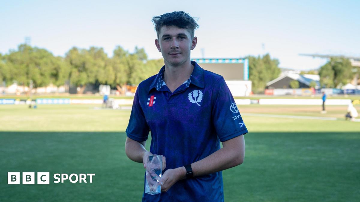 Mackenzie Jones with player of the match trophy