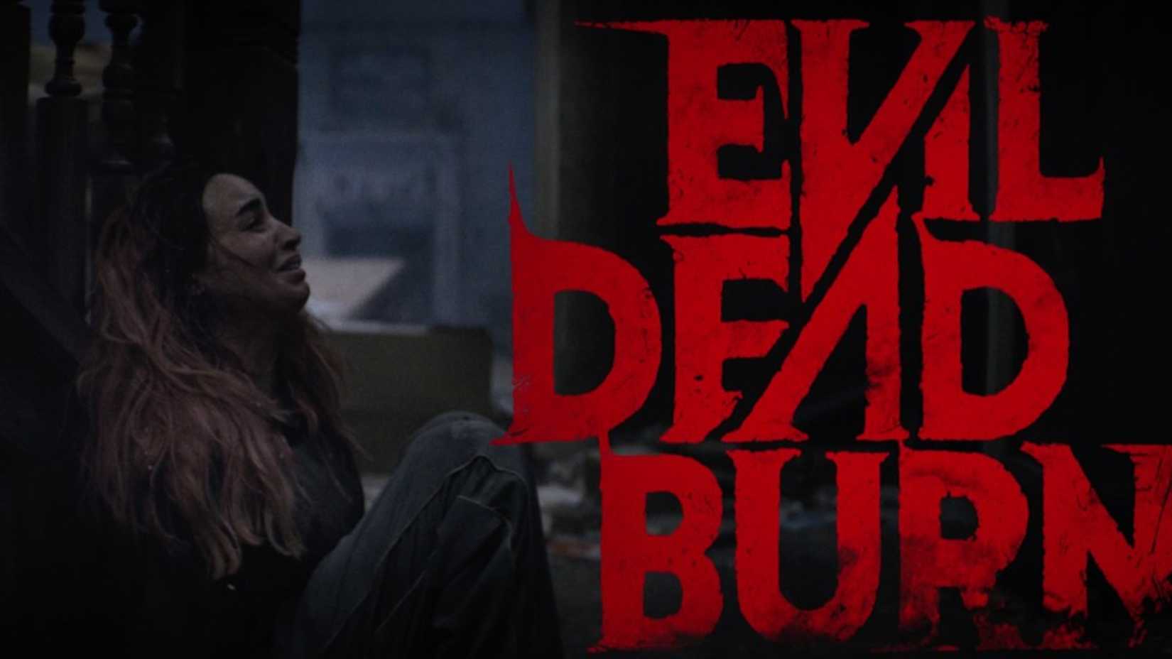 A woman looking horrified next to the Evil Dead Burn logo