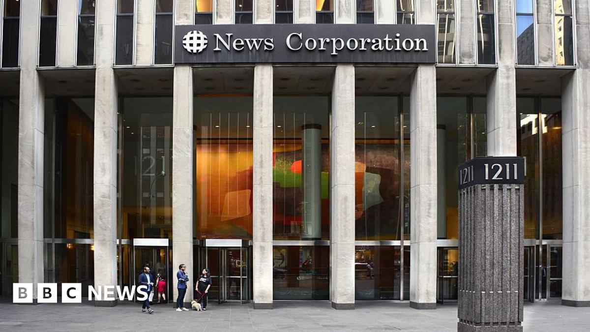 Exterior image of an office building with the words "News Corportation" on it, some people are in the foreground of the image walking.
