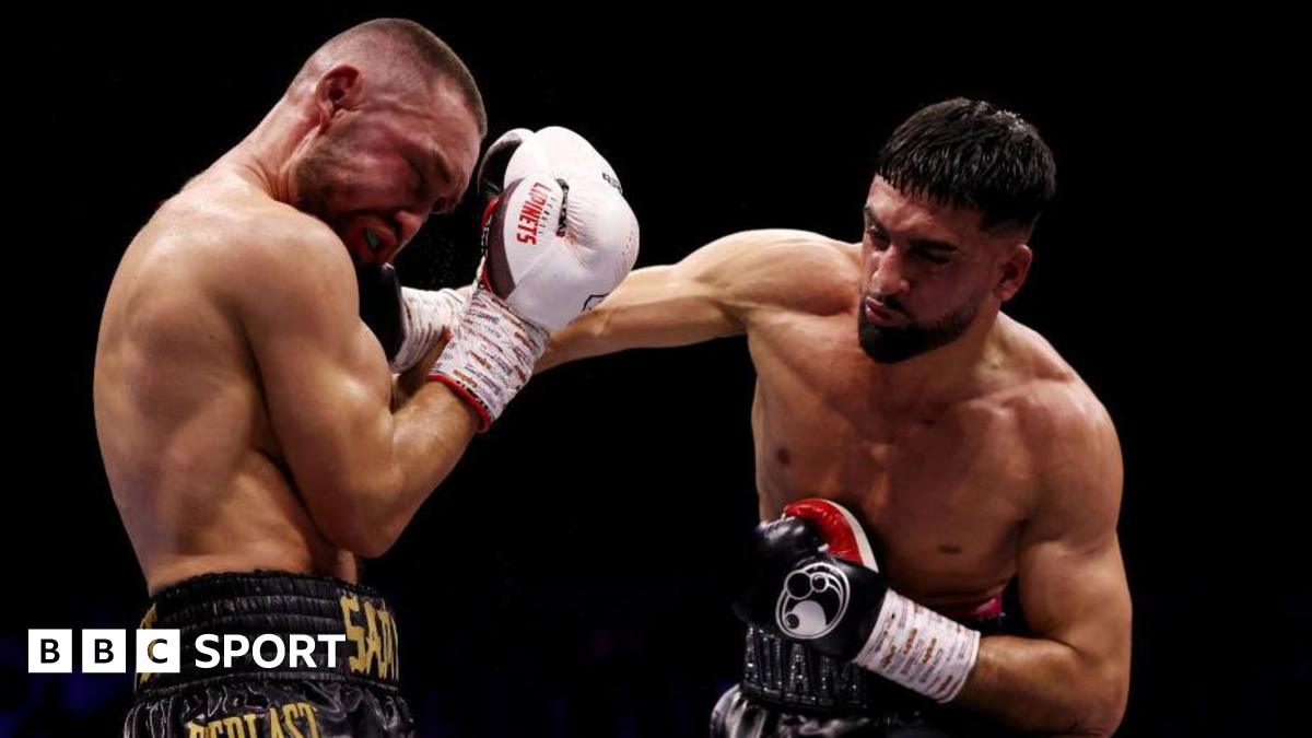 Adam Azim throws a punch in the ring