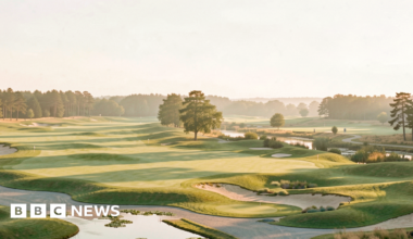 The mock up shows a golf course, with greens, bunkers and water hazards on a sunny day.
