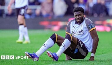 Patrick Agyemang is sat on the ground when playing for Derby against Stoke