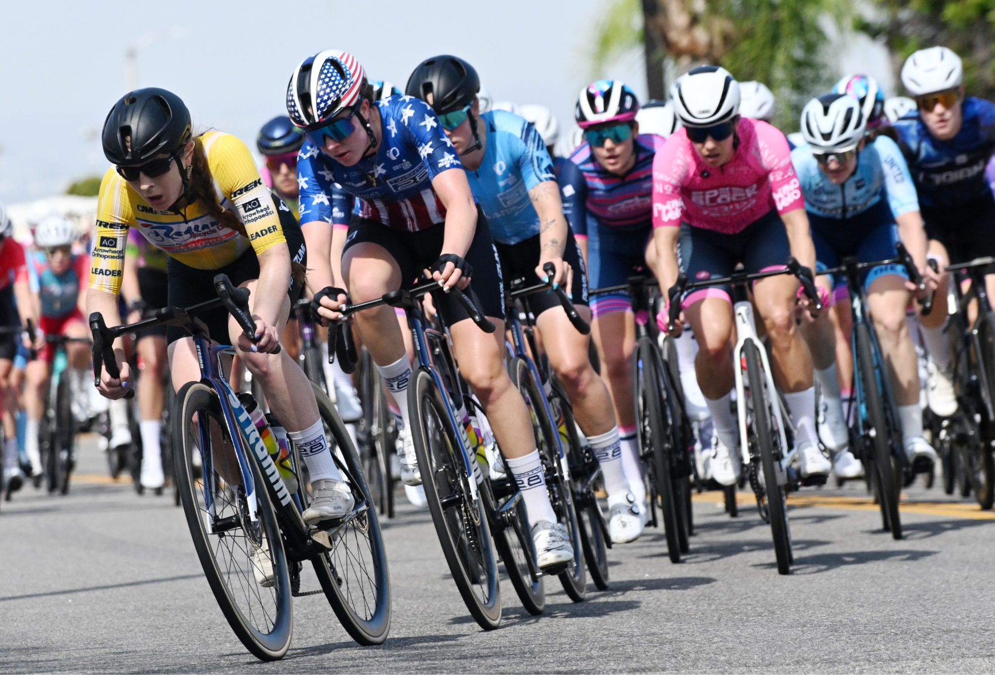 Ella Sabo (Virginia&rsquo;s Blue Ridge TWENTY28) is led out by teammate Emily Ehrlich, wearing the leader's jersey, on stage 2