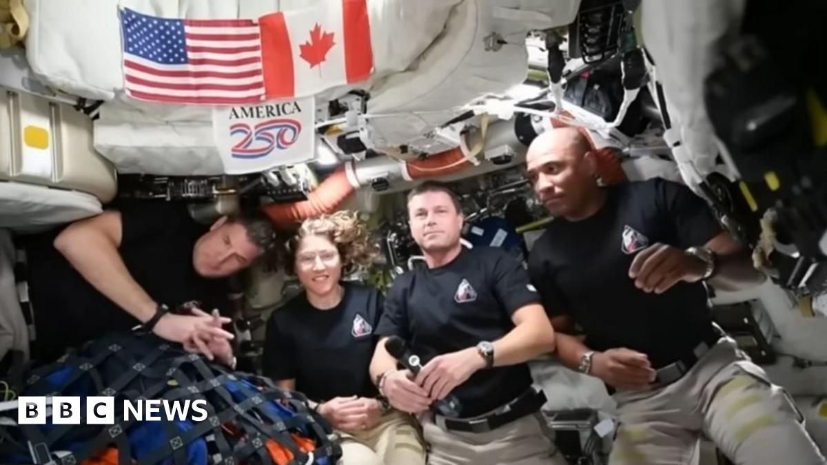 Three people in a spaceship