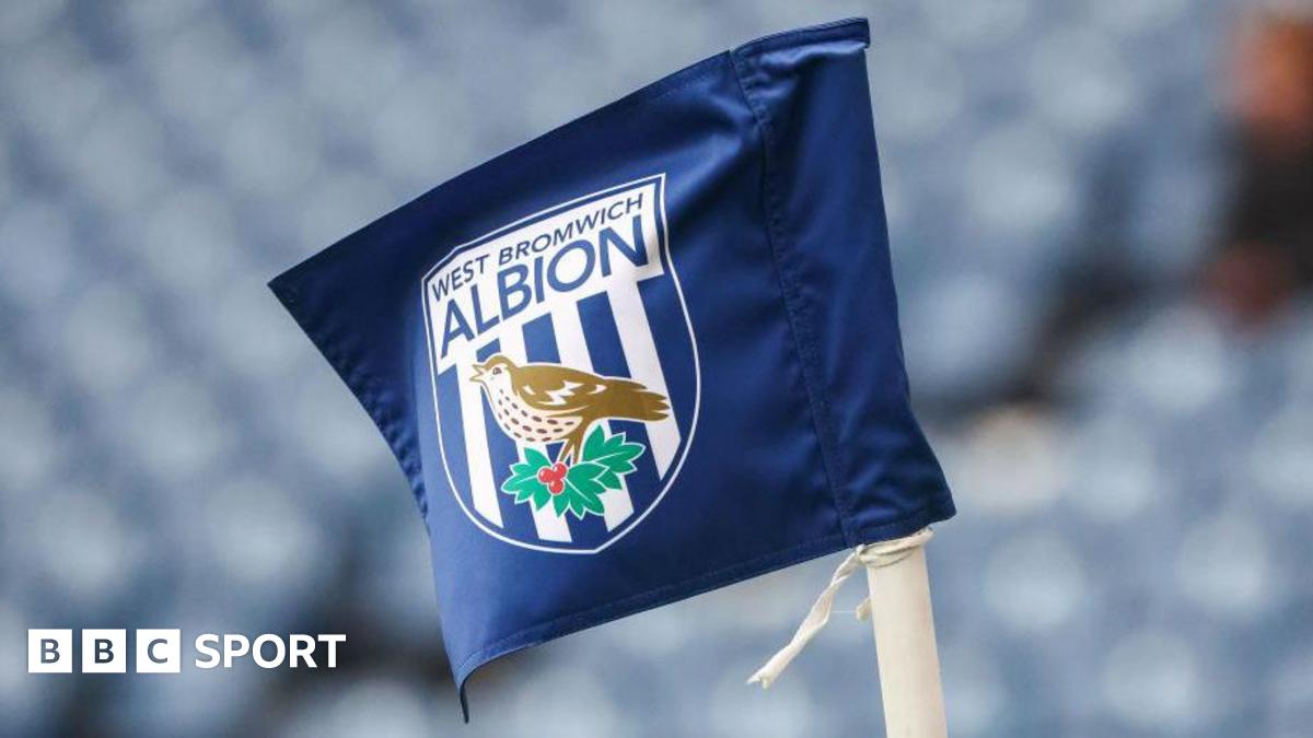 A corner flag with the West Brom badge