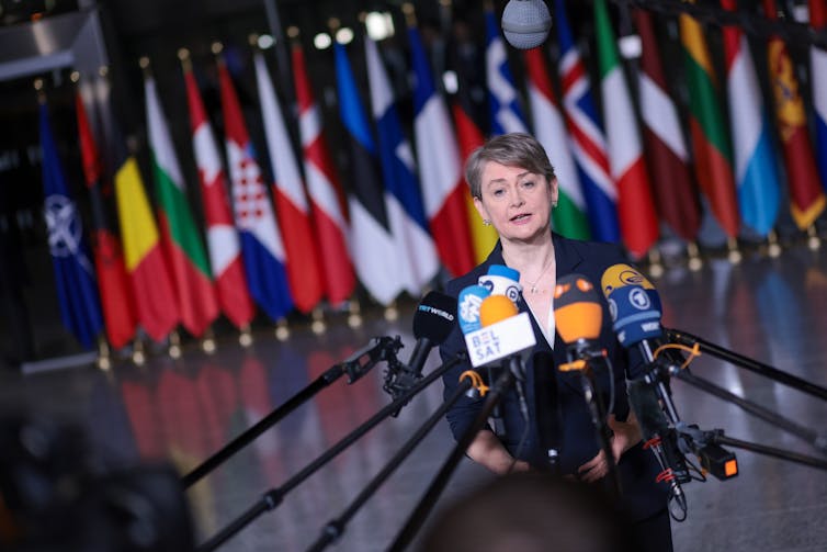 uk foreign secretary yvette cooper addresses journalists at a nato conference in brussels in december 2025.