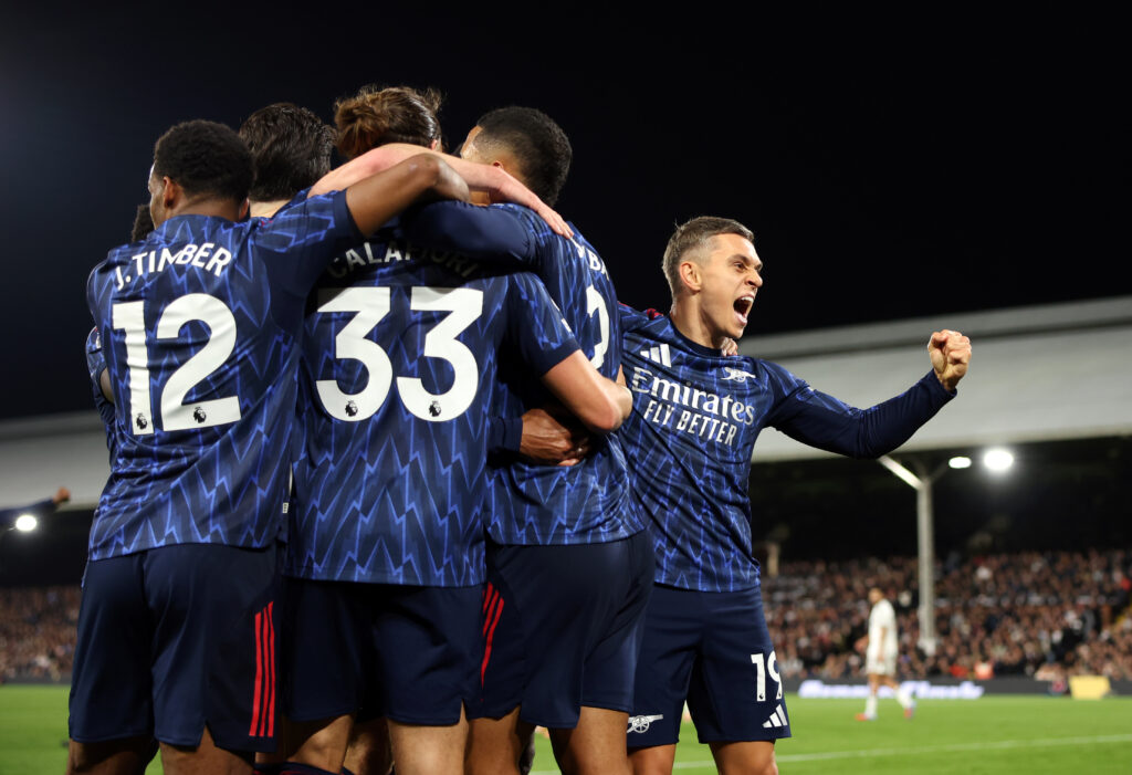 LONDON, ENGLAND - OCTOBER 18: Leandro Trossard of Arsenal celebrates scoring his team's first goal with teammates during the Premier League match between Fulham and Arsenal at Craven Cottage on October 18, 2025 in London, England. (Photo by Alex Pantling/Getty Images)